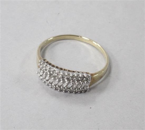 A 9ct gold and triple band round and baguette cut diamond ring, size S.